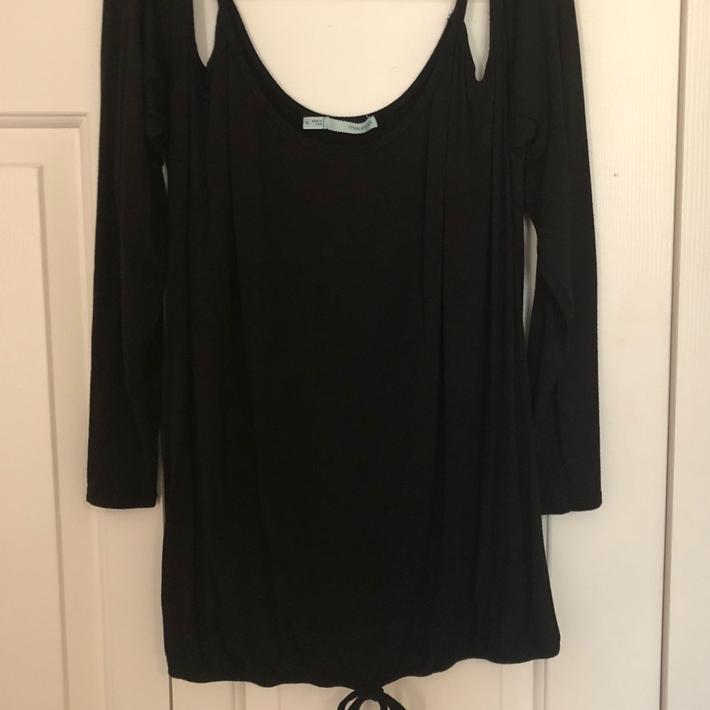 Off the shoulder, long sleeved women’s top